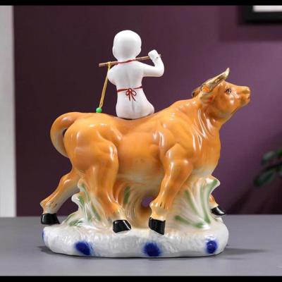 TƯỢNG SỨ TIỂU ĐỒNG CƯỠI TRÂU THỔI SÁO